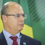 JairBolsonaro-FlavioBolsonaro-WilsonWitzel-ChaseCarey-Formula1-Rio-24Jun2019